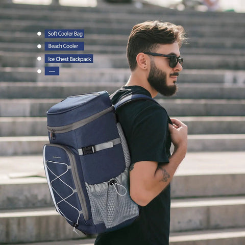 Man carrying blue 35 Can Leakproof Insulated Cooler Backpack For Beach Camping Kayaking And Hiking, Soft Ice Chest Bag on steps