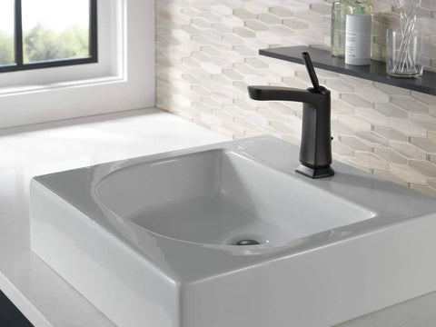 Vesna Single Hole Bathroom Faucet With Single Handle Chrome Finish installed on white sink with deck plate in modern bathroom.
