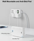6 USB Travel Power Strip Surge Protector 4 AC Outlets 5 Ft Extension Cord mounted on wall with anti-skid pad.