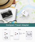 6 In 1 European Travel Plug Adapter With 3 US Outlets And 2 USB A Ports Plus 1 USB C displayed with travel items