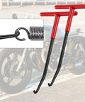 Two red T-shaped exhaust spring pullers with curved hooks for motorcycle exhaust spring removal