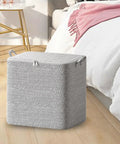 Clothes Storage Bags With Zipper, Foldable Wardrobe Organizer Bins, 110L Capacity, Non Woven Material in a bedroom setting