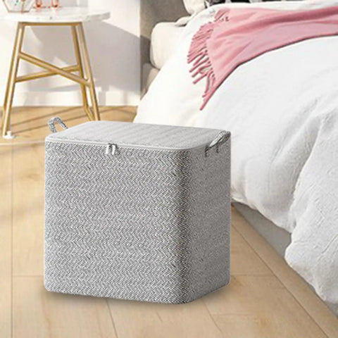 Clothes Storage Bags With Zipper, Foldable Wardrobe Organizer Bins, 110L Capacity, Non Woven Material in a bedroom setting