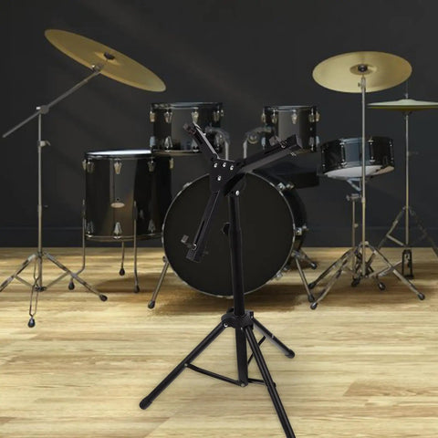 Rock Solid Adjustable 12 Inch Snare Drum Rack Tripod Stand Black Foldable Alloy Practice Rig with wide base in a music studio.