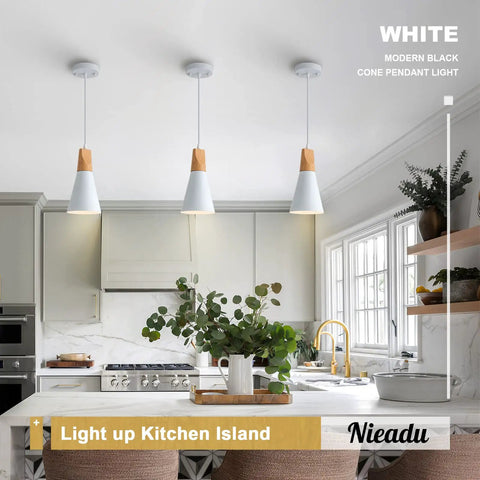 Three Pack White Modern Minimalist Pendant Lights Kit With Mounting Hardware And Instructions above a bright kitchen island.