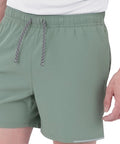 Close-up of 2 In 1 Running Shorts With Built In Liner For Men, 5 Inch Inseam, Woven Stretch Quick Dry Fabric, Hedge Green.