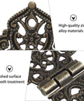 Close-up of Antique Zinc Alloy Butterfly Hinges, highlighting decorative design and smooth finish, for DIY projects and cabinets.