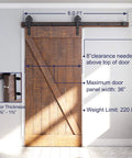 Heavy Duty Sliding Barn Door Hardware Kit In Black For Smooth Quiet Operation And Easy Installation, Industrial Bigwheel Hangers Support Up To 220 Lb, Fits 36 Inch Wide Panels, Solid Steel With Black Powder Coat For Lasting Performance In Home Or Workshop installed on 36-inch wooden door