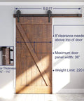 Heavy Duty 5 Foot Sliding Barn Door Hardware Kit For 4 To 18 Foot Rails Black Solid Steel That Runs Smoothly And Quietly Easy Install Fits 30 Inch Wide Panels Up To 220 Lb Capacity Beefy Industrial Bigwheel Hangers installed on wood door.