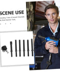 Heavy Duty Pneumatic Air Hammer Bit Kit With Smooth Chisels And Pin Punch Tools For Tight Auto Repair Tough Construction Jobs And Badass Metal Work Out The Box. man holding blue air hammer with 7 black bits