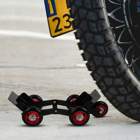 Amosfun Motorcycle Tire Dolly Tool With Five Smooth Wheels Heavy Duty Vehicle Mover under a tire in a garage setting.