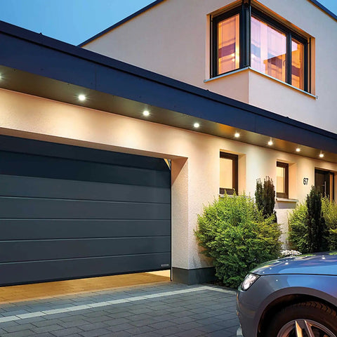 Modern home with closed garage, suitable for Garage Door Safety Sensor Replacement Kit 41A5034 for LiftMaster Sears Chamberlain Craftsman Openers Made After 1997 Includes Two Sensors Plug And Play Install.