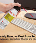 Person using Heavy Duty Compressed Air Duster For Electronics And Office Gear 10 Oz Cans Two Pack With Precision Nozzle For Keyboard Cleaning