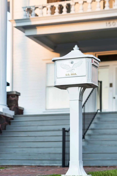 Front view of Hamilton Large Capacity Cast Aluminum Post Mount Mailbox Built To Last With Side Door Access in a residential setting