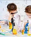 Two Pack pH Test Strips Universal Range 1 to 14 Litmus Paper Kit shown in a chemistry classroom with students using microscopes.