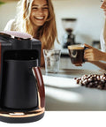 Electric Turkish Coffee Maker 550W 250ml Portable Single Serve Brewer For Home Office Travel With Cup on a kitchen countertop