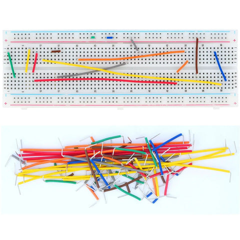 Breadboard with scattered 840 piece breadboard jumper wires kit with fourteen lengths from two millimeters to one hundred twenty five millimeters for Arduino projects and DIY electronics includes sixty wires per size for easy prototyping made for makers.