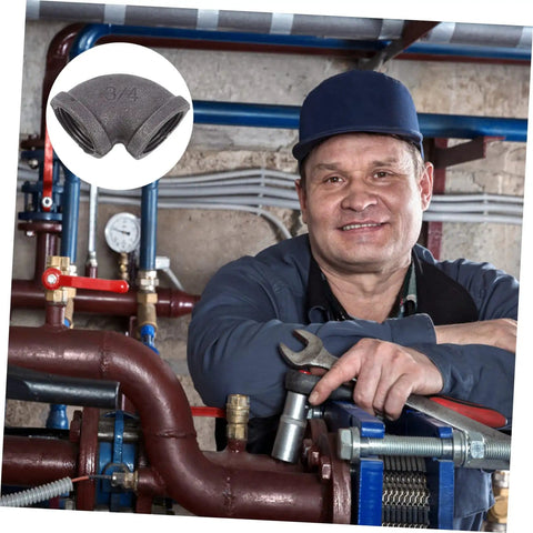 Plumber holding a wrench with a close-up of a 3/4 inch elbow iron pipe fitting. Elbow Iron Pipe Fitting Set, Six Pieces, Industrial Connectors.