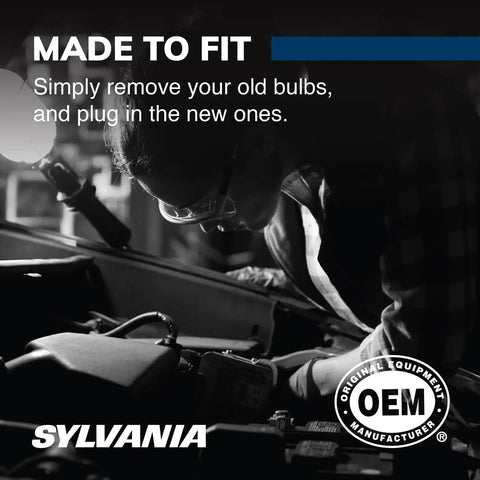 Mechanic installing 3157 SilverStar Mini Bulbs Brighter White Light For Daytime Running Lights And Back Up Reverse Lights Two Pack