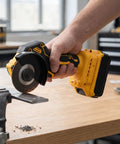 Kickass 3 Inch Brushless Mini Circular Saw With 12000 RPM And 3 Speed Settings cutting metal, sparks flying, compact design, workspace.