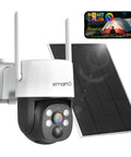 No Monthly Fee Solar Wireless Security Camera Outdoor With PTZ And AI Tracking Color Night Vision Thermal Detection 5G Dual Band WiFi 6 Self Powered By Solar Weatherproof in front of solar panel with night color feature.