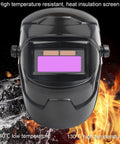 Solar Powered Auto Darkening Welding Helmet With 180 Degree Adjustable Shield LCD Lens against fire and ice background