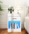 Ultra Sleek White Nightstand Packs A Rapid Charging Hub And Ambient Led Lighting While Guarding A Legit Hidden Safe For Stashing Cash And Electronics Plus Extra Power Outlets, showcasing drawer and illuminated shelf.