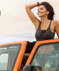 Person smiling from orange Wrangler, inset shows Heavy Duty Aluminum Sun Visor Repair Kit With Rugged Mounting Clips for off-road toughness.