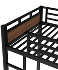 Corner detail of Detachable Twin XL Bunk Bed With Metal Guardrails In Walnut Finish, showing steel frame and walnut panel.