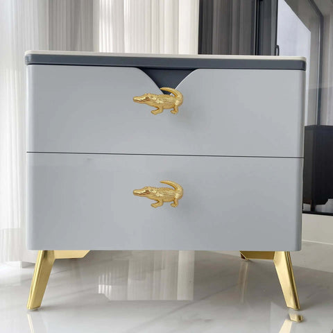 Crocodile Shaped Cabinet Knobs Set Of 4 In Zinc Alloy Decorative Drawer Pulls For Dresser in vintage gold, mounted on drawer
