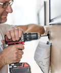 Man using drill with 14 Piece Forstner Bit Set With Carbide Tips For Woodworking, Pro Grade Bits For Hard Wood, Plastic, And Plywood.
