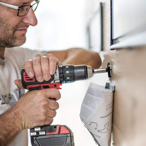 Man using drill with 14 Piece Forstner Bit Set With Carbide Tips For Woodworking, Pro Grade Bits For Hard Wood, Plastic, And Plywood.