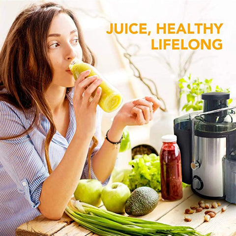 Woman enjoying juice from Heavy Duty Stainless Steel Juicer With Extra Wide Mouth For Smooth Extraction And No Pomace Or Pulp Leftovers.