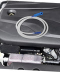 Flexible Brake Bleeder Hose 47 Inch Clear Tubing For Brake Fluid DIY Pro Grade Oil Line visible on vehicle engine block.