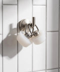 Stainless Steel Ring White Drain Stopper Silicone for Sinks on a wall hook, featuring two silicone stoppers for easy access.