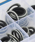 Close-up of 45 Piece Pro Grade AC Compressor Gasket Kit with various sizes in a clear labeled box.