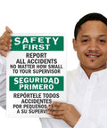 Heavy Duty Bilingual Safety Sign Saying Report All Workplace Accidents To Supervisor 10X14 Inch Durable HDPE Plastic Wall Plaque, displayed by a person.