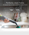 Canister steam cleaner in action, focusing on easy grime removal with steam on sink surface. Score A Spotless Shine With Zero Toxic Chemicals This Canister Steam Cleaner Blasts Away Grime On Floors Grout Windows And Autos Using Intense Vapor Power Plus 15 Game Changing Attachments And Smooth Rolling Mobility For Easy Peasy Room To Room Cleans.
