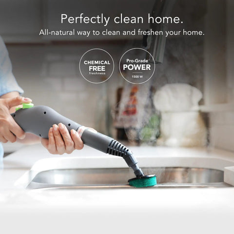 Canister steam cleaner in action, focusing on easy grime removal with steam on sink surface. Score A Spotless Shine With Zero Toxic Chemicals This Canister Steam Cleaner Blasts Away Grime On Floors Grout Windows And Autos Using Intense Vapor Power Plus 15 Game Changing Attachments And Smooth Rolling Mobility For Easy Peasy Room To Room Cleans.