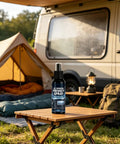 Frosted Glass Spray 30ml Portable Anti-Glare Privacy Liquid on a camping table near a tent and RV.
