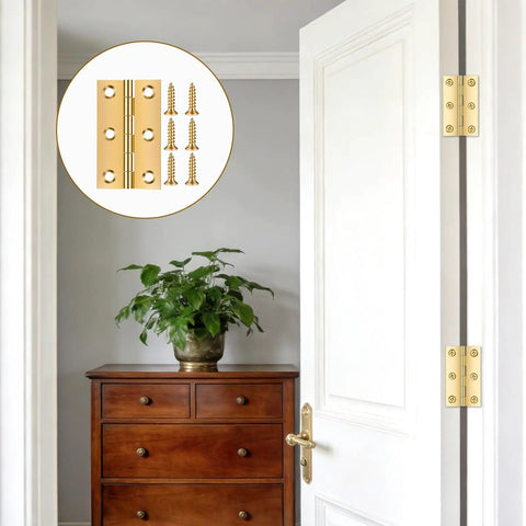 2 Inch Brass Hinges With 24 Screws 4 Pack Small Hinge Set installed on a white door next to a wooden cabinet in a room.