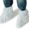 Person wearing white boot covers, a part of Grab-And-Go Compact Spill Kit Bucket With Absorbent Socks Powder Gloves Goggles Boot Covers And Coverall For Universal Spill Cleanup Of Water Oil And More Up To 40 Gallons In Home Garage Or Workshop