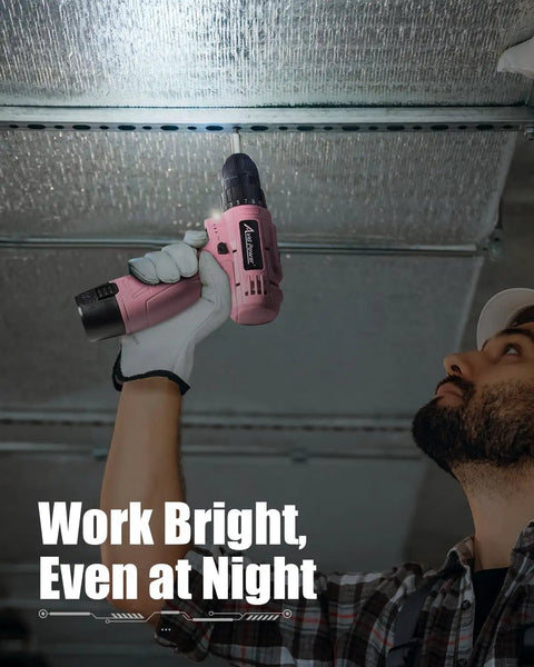 Pink 12V Cordless Drill And Driver Set With 21 Bits For Women, No Sweat Power Screwdriver For DIY Home Repairs, Smooth Operator Variable Speed Hand Tool Kit in use with LED light.