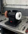 Hot New 18V Lithium Battery Grinding Machine With Double Wheels For Coarse And Fine Tasks Lightweight Portable Bench Grinder Tool displayed on a workbench.