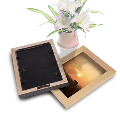 Picture frames on table with Sawtooth Picture Frame Hangers With Screws Black Metal Heavy Duty 39mm By 7mm By 4mm Easy Install
