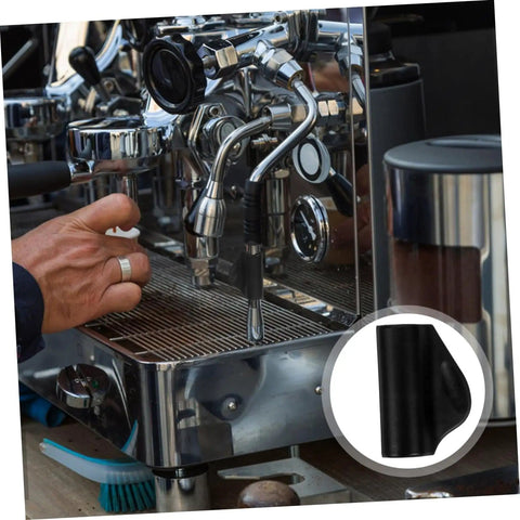 Barista using espresso machine with Compact Rubber Insulation Sleeve Heatproof For Steam Wand, close-up.