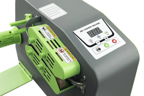 Heavy Duty High Speed Air Cushion Machine Rolls Out Bulletproof Air Pillows At Thirty Nine Feet Per Minute Cranks To Hot In Thirty Seconds For Smooth Shipping Hustle, showing control panel and heating assembly.