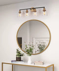 Modern Black And Gold Vanity Lights Over Mirror, Four Light Bathroom Fixture With Clear Glass Shades, Sleek Contemporary Wall Mount