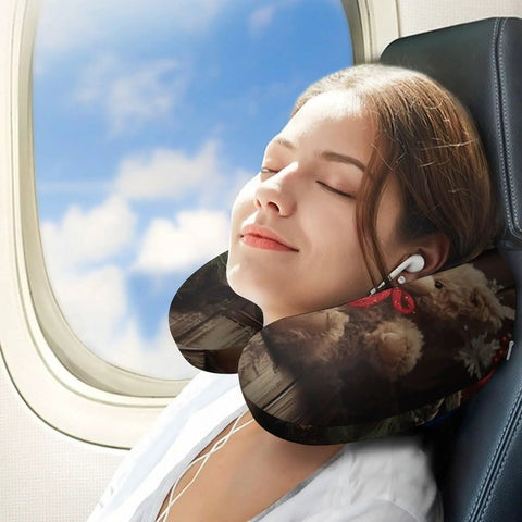 Woman using Xmas Tree Branch Bear Doll Travel Pillow U Shaped Neck Support Pillow For Long Haul Flights And Office Naps on airplane