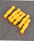 Close-up of yellow insulated wire crimp connectors from Insulated Wire Crimp Connector Kit With 50 Male And 50 Female Quick Disconnects.